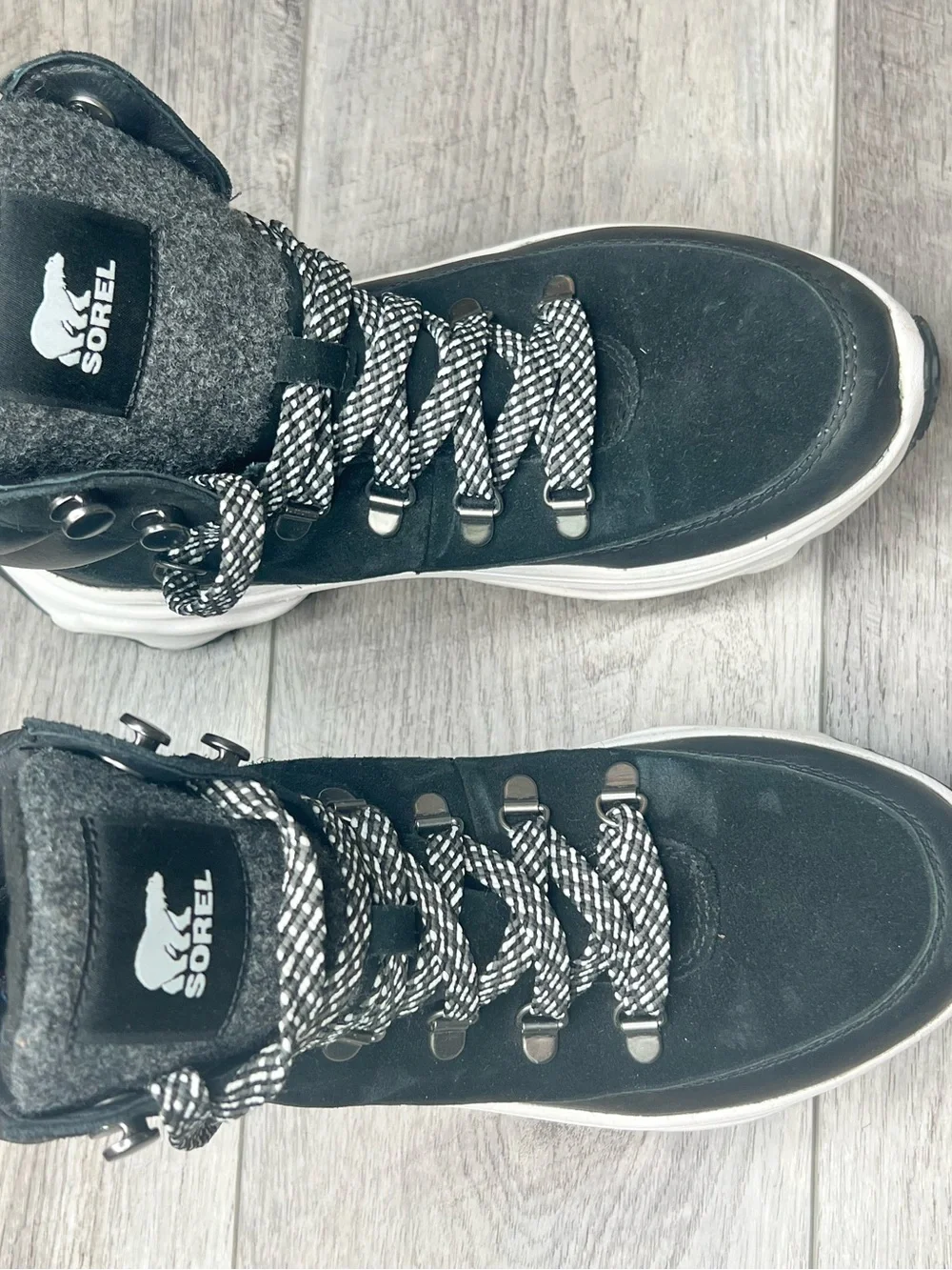 Sorel Black Lace-Up Winter Boots with White Accents